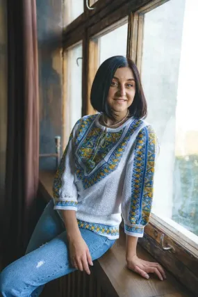 Knitted women's vyshyvanka with a yellow-blue ornament